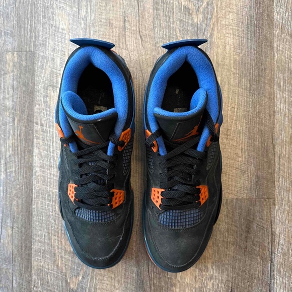 black blue orange jordan 4